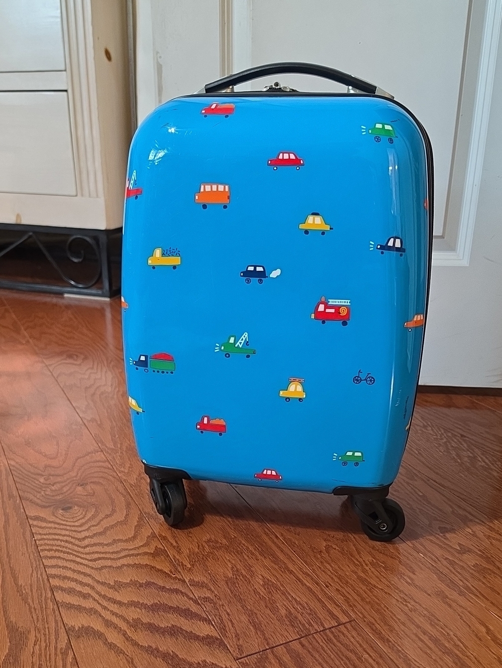 Marshalls Bright Blue Kids Rolling Suitcase with Colorful Car Print